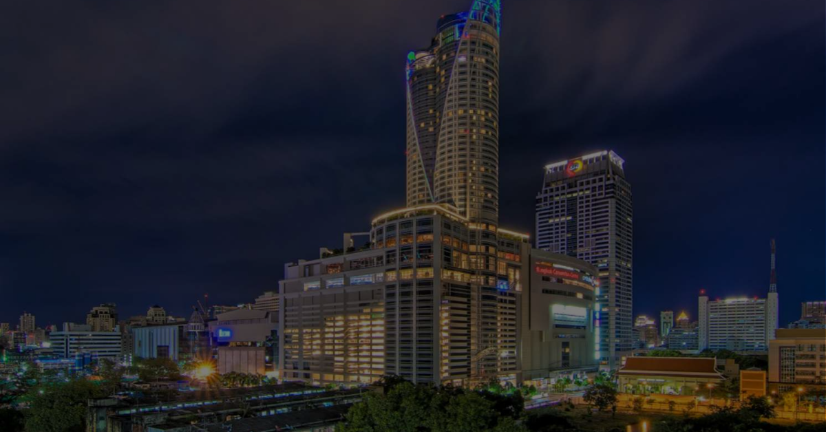 Alt Text: Bangkok skyline at dusk with Centara Grand lit up during Affiliate World Asia week.